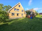 Ruhiges Wohnen, starke Anbindung – Kapitalanlage in gefragter Lage Möllns! - Hausansicht / Garten