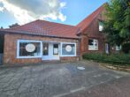 Modernisierter Klassiker! Rotklinkercharme mit neuem Innenleben und Gewerbe! - Hausansicht mit Laden